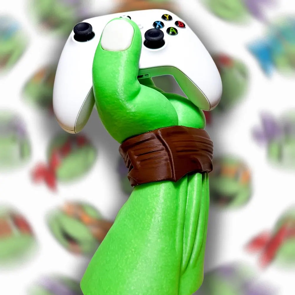 TMNT Teenage Mutant Ninja Turtles Arm Hand Controller & Headphone Stand